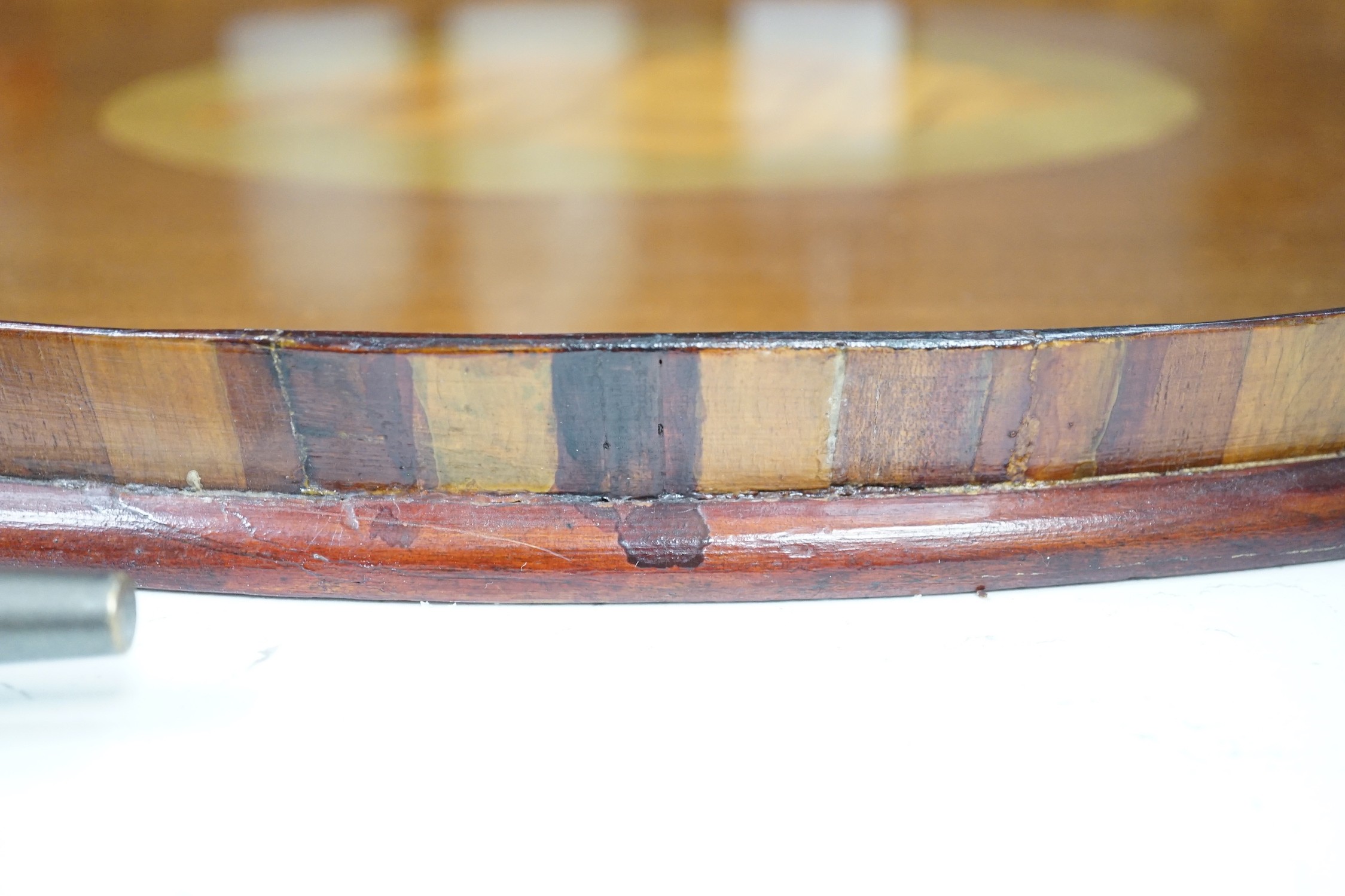 An Edwardian oval inlaid tea tray. 61cm long